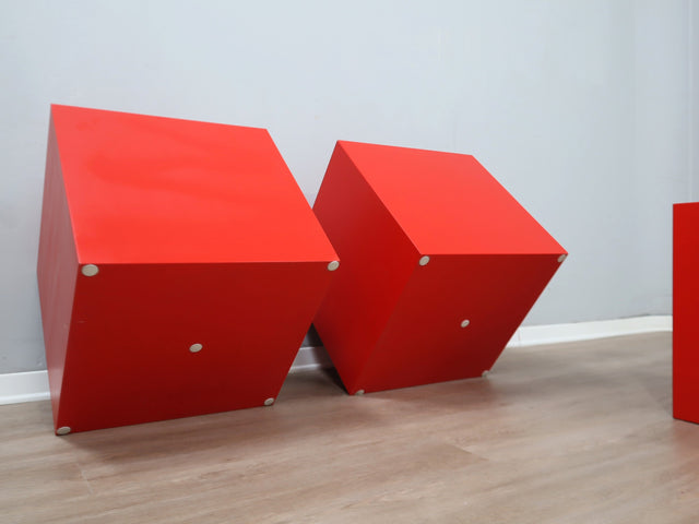 Original set of three cubic fiberglass stools/side tables, crafted in Italy during the 1960s. Their versatility allows them to function seamlessly as extra seating, occasional tables, or modular elements