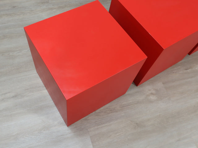Original set of three cubic fiberglass stools/side tables, crafted in Italy during the 1960s. Their versatility allows them to function seamlessly as extra seating, occasional tables, or modular elements