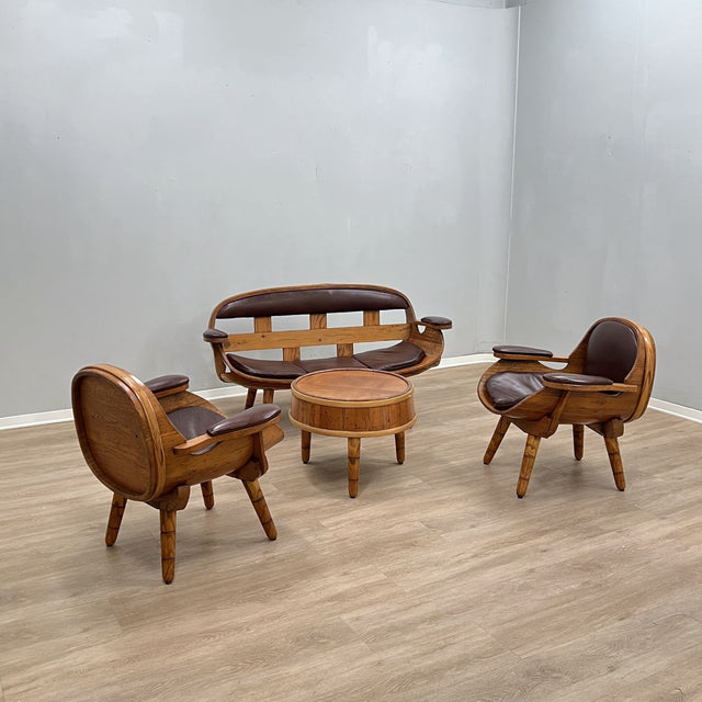 1970s Italian rustic bentwood and aged leather living room set with sofa, barrel armchairs, coffee table. Salotto vintage legno e pelle.