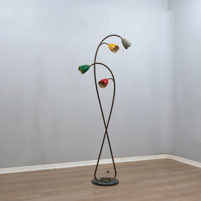 1950s Italian Biancardi e Jordan floor lamp with curved brass stem, green marble base, and multi-colored aluminum flower shades.