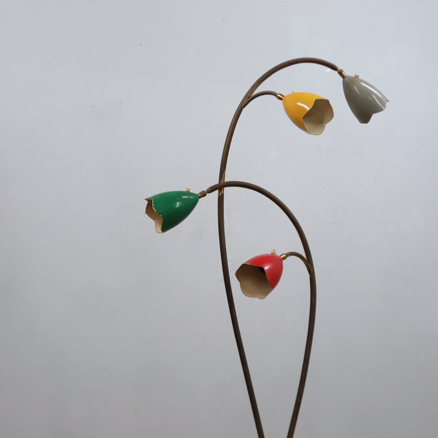 1950s Italian Biancardi e Jordan floor lamp with curved brass stem, green marble base, and multi-colored aluminum flower shades.