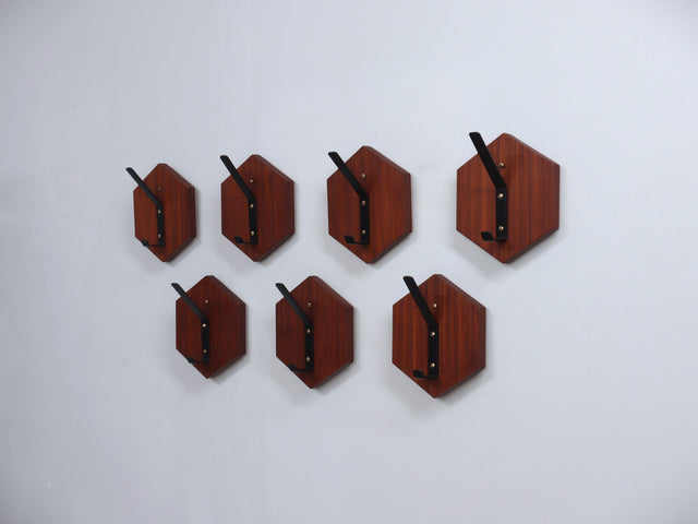 Set of 7 vintage teak wall hooks 1950s modular hexagonal design