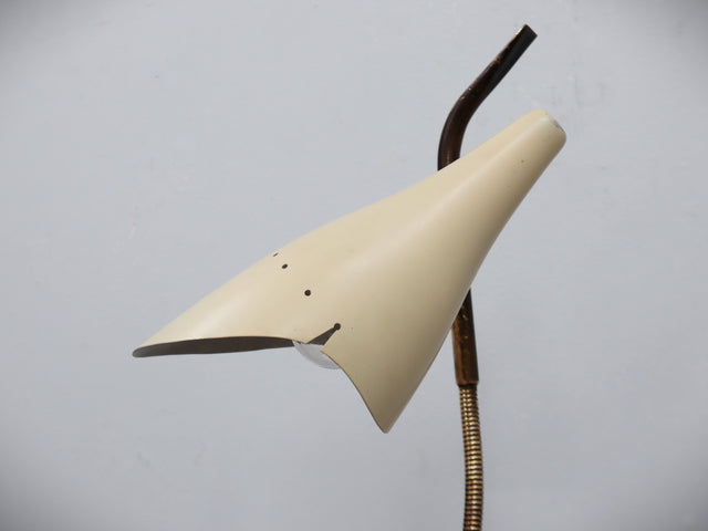 Rare and elegant table lamp designed by Oscar Torlasco for Lumen in the 1950s, a remarkable example of post-war Italian design.