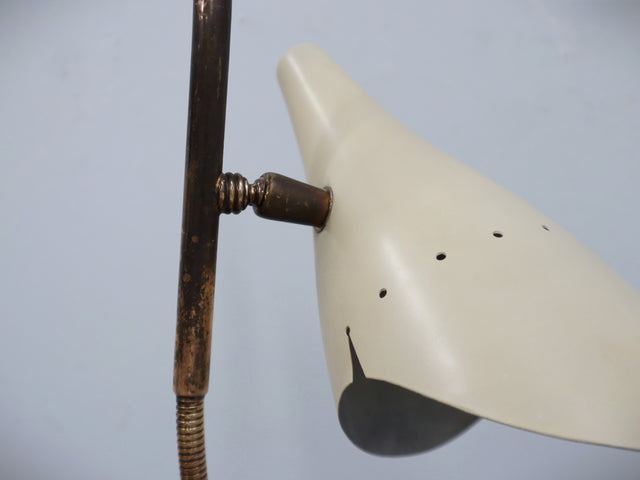 Rare and elegant table lamp designed by Oscar Torlasco for Lumen in the 1950s, a remarkable example of post-war Italian design.