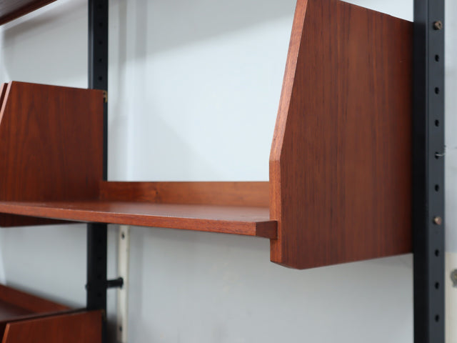 Mid-Century Italian modular wall unit with folding desk 1950s. The modular elements, crafted in teak veneer, include open shelves