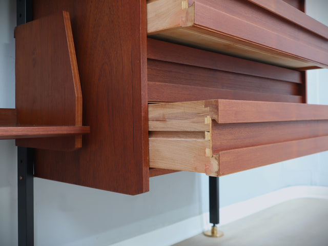 Mid-Century Italian modular wall unit with folding desk 1950s. The modular elements, crafted in teak veneer, include open shelves