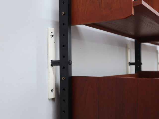 Mid-Century Italian modular wall unit with folding desk 1950s. The modular elements, crafted in teak veneer, include open shelves mobile teak anni 50, mobile anni 60
mid century teak wall unit, mid century italian furniture, mid century ceiling wall unit, mid century bookshelf, meubles anciens à vendre