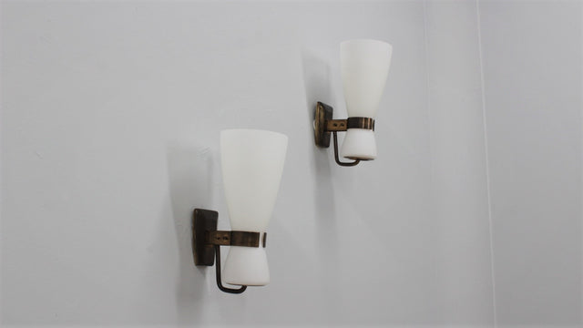 Mid-century brass and glass sconces by STILNOVO