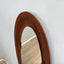 Campo e Graffi 1960s oval teak mirror, shell shape with circular mid-point accents. Totally restore, excellent condition. Unique vintage mirror commands attention.