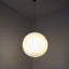 1970s Italian Cocoon globe pendant lamp with teak wood details. Lampadario Cocoon anni 70. Suspension vintage Italienische Kugellampe.