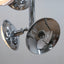 1970s chandelier Esperia, combining the brilliance of chrome-plated metal with the refinement of Murano glass shades. The vertical structure extends into six adjustable arms