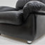 Sormani black leather vintage armchairs 1970s