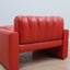 1970s Luigi Massoni for Poltrona Frau red leather lounge chair with storage ottoman.  Fauteuil de chambre en cuir rouge années 70