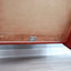 1970s Luigi Massoni for Poltrona Frau red leather lounge chair with storage ottoman.  Fauteuil de chambre en cuir rouge années 70