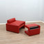 1970s Luigi Massoni for Poltrona Frau red leather lounge chair with storage ottoman.  Fauteuil de chambre en cuir rouge années 70