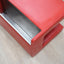 1970s Luigi Massoni for Poltrona Frau red leather lounge chair with storage ottoman.  Fauteuil de chambre en cuir rouge années 70
