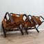 This original set of 1960s lounge chairs, designed by Tito Agnoli bamboo and leather arcmhair, lounge chair Bonacina vintage Fauteuils en bambou et cuir..