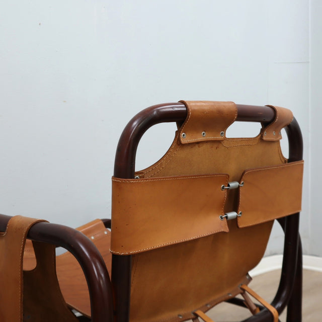 This original set of 1960s lounge chairs, designed by Tito Agnoli bamboo and leather arcmhair, lounge chair Bonacina vintage Fauteuils en bambou et cuir..