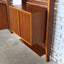 Asymmetric 1950s Italian teak wall unit with slatted back and plywood shelves. Teak Regal, estantería teca, bibliothèque teck, libreria dogat