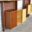Asymmetric 1950s Italian teak wall unit with slatted back and plywood shelves. Teak Regal, estantería teca, bibliothèque teck, libreria dogat