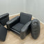 Pair of 1970s Italian Busnelli Piumotto black leather armchairs with original stamped ABS bases. Coppia poltrone Piumotto Busnelli in pelle nera.