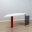 1980s Saporiti Post-Modern desk by Franco Corradini, sail-shaped white top, red metal legs. Scrivania vintage anni 80. Bureau Memphis design.