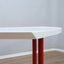 1980s Saporiti Post-Modern desk by Franco Corradini, sail-shaped white top, red metal legs. Scrivania vintage anni 80. Bureau Memphis design.