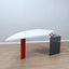 1980s Saporiti Post-Modern desk by Franco Corradini, sail-shaped white top, red metal legs. Scrivania vintage anni 80. Bureau Memphis design.