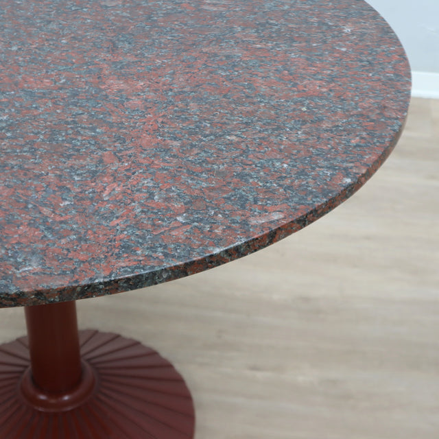 Peter Noever dining table, Zanotta red granite table, 1979 Postmodern marble table, round pedestal dining table