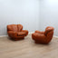 1970s Italian leather clamshell lounge armchairs. Paire de fauteuils coquille cuir 70s. Paar Italienische Muschel Ledersessel 1970er.