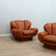 1970s Italian leather clamshell lounge armchairs. Paire de fauteuils coquille cuir 70s. Paar Italienische Muschel Ledersessel 1970er.