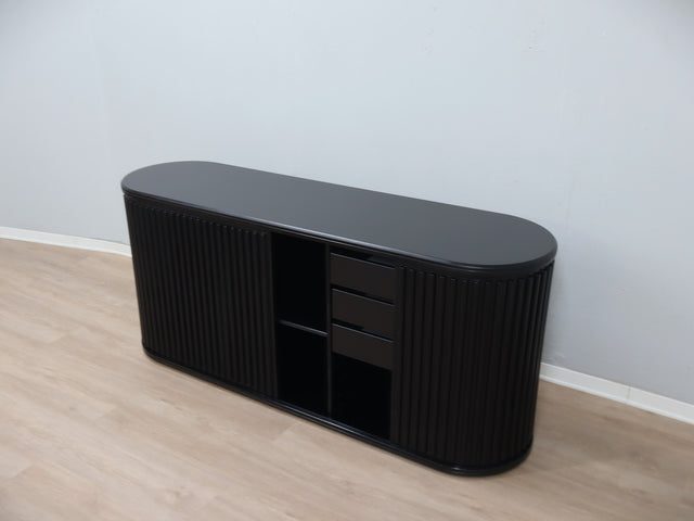 A’dammer storage unit, designed by Aldo van den Nieuwelaar and produced by De Padova in the late 1970s, renowned for its minimalist aesthetic and distinctive tambour doors that slide smoothl