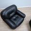 Pair of restored 1970s Mobil Girgi Sapporo armchairs in black leather. Coppia poltrone Sapporo Mobil Girgi pelle nera. Paire de fauteuils Sapporo cuir noir. Paar Sapporo Ledersessel.