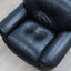 Pair of restored 1970s Mobil Girgi Sapporo armchairs in black leather. Coppia poltrone Sapporo Mobil Girgi pelle nera. Paire de fauteuils Sapporo cuir noir. Paar Sapporo Ledersessel.