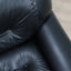 Pair of restored 1970s Mobil Girgi Sapporo armchairs in black leather. Coppia poltrone Sapporo Mobil Girgi pelle nera. Paire de fauteuils Sapporo cuir noir. Paar Sapporo Ledersessel.