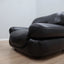 Pair of restored 1970s Mobil Girgi Sapporo armchairs in black leather. Coppia poltrone Sapporo Mobil Girgi pelle nera. Paire de fauteuils Sapporo cuir noir. Paar Sapporo Ledersessel.