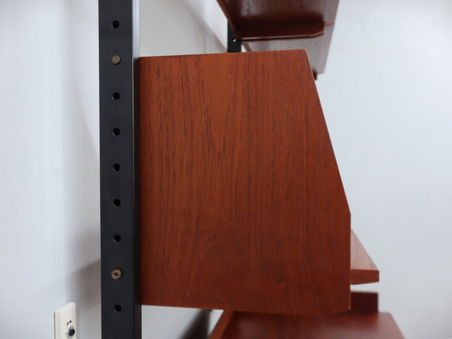 Mid-Century Italian modular wall unit with folding desk 1950s. The modular elements, crafted in teak veneer, include open shelves 