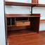 Mid-Century Italian modular wall unit with folding desk 1950s. The modular elements, crafted in teak veneer, include open shelves mobile teak anni 50, mobile anni 60
mid century teak wall unit, mid century italian furniture, mid century ceiling wall unit, mid century bookshelf, meubles anciens à vendre