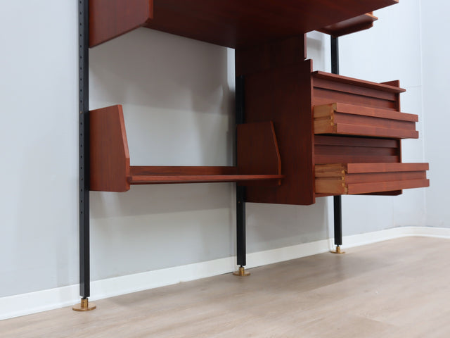 Mid-Century Italian modular wall unit with folding desk 1950s. The modular elements, crafted in teak veneer, include open shelves 