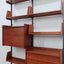 Mid-Century Italian modular wall unit with folding desk 1950s. The modular elements, crafted in teak veneer, include open shelves mobile teak anni 50, mobile anni 60
mid century teak wall unit, mid century italian furniture, mid century ceiling wall unit, mid century bookshelf, meubles anciens à vendre